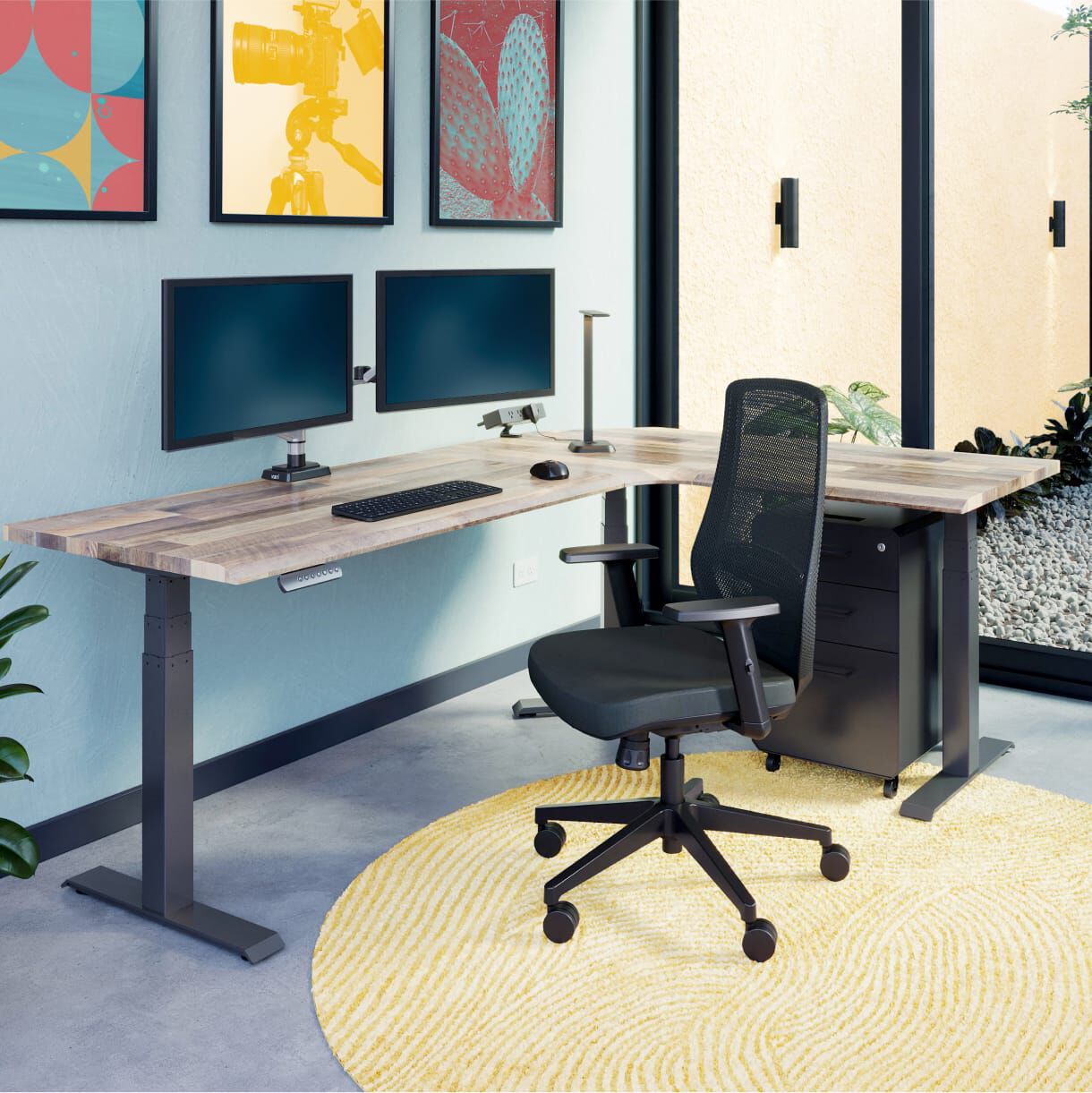 L shape electric standing desk in office 